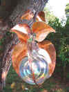 Copper artwork protected from tarnish. Click on picture for larger image. 