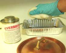 Gently squeeze out excess coating. Gently squeeze out excess coating.